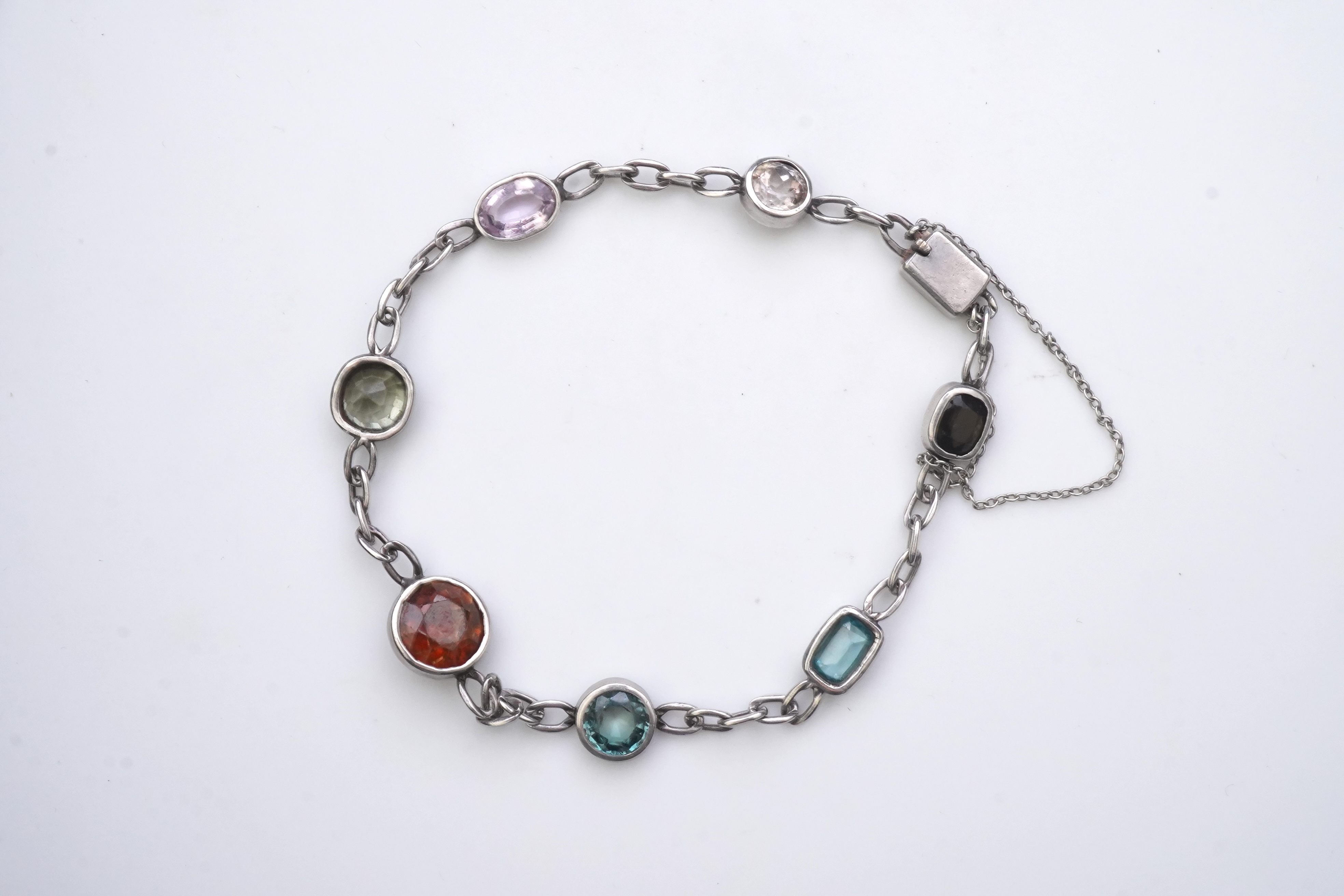 A collection of silver and gem-set jewellery